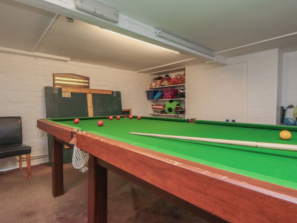 A game room with a snooker table and balls at Meltham Guest House in Scarborough