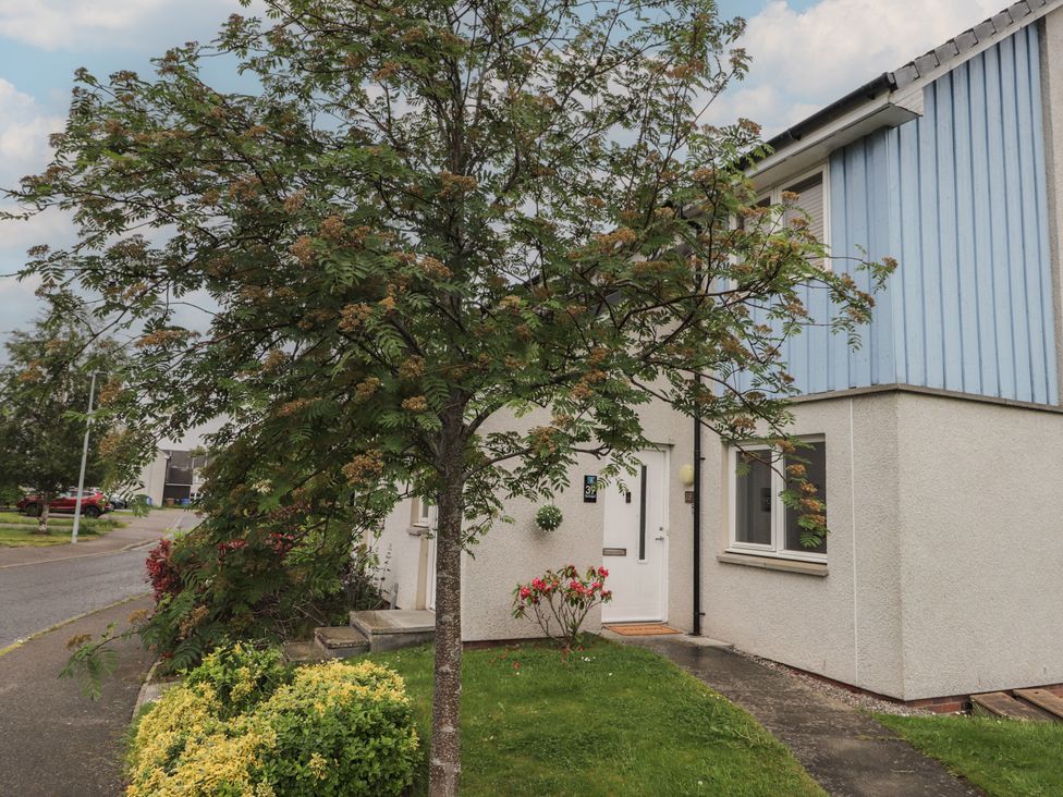 A house exterior with a door and garden at 39 Knocknagael in Inverness