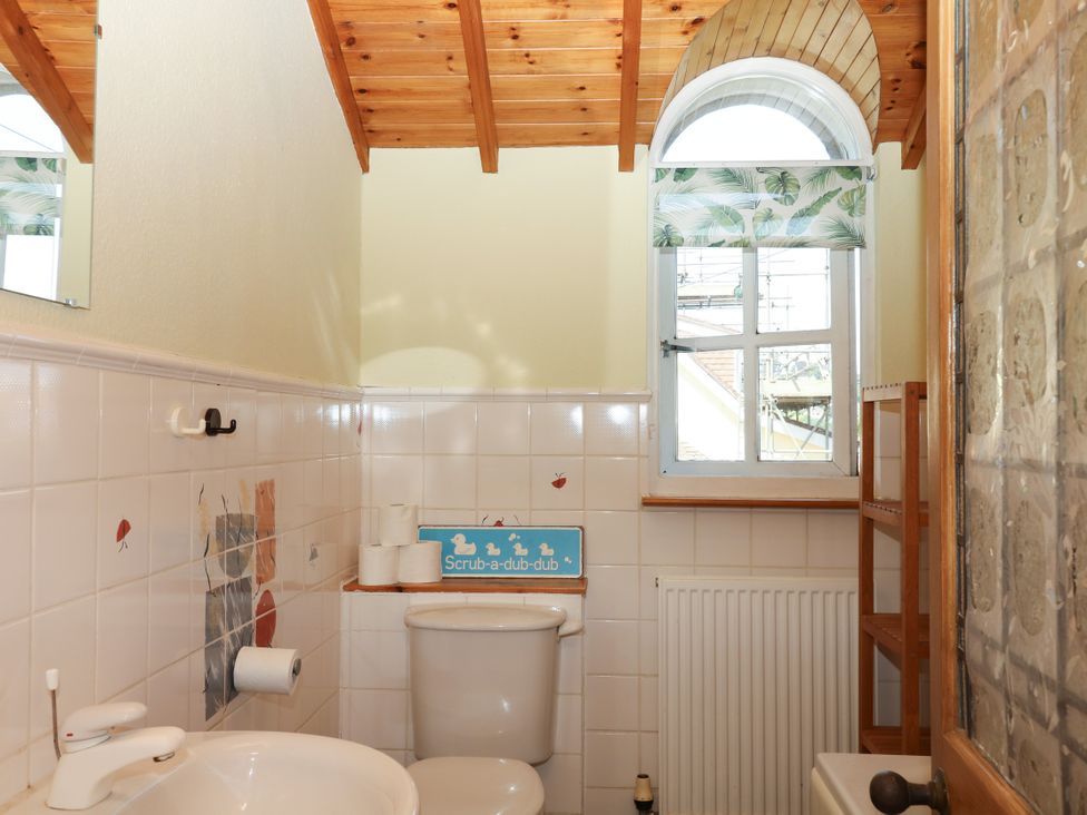 A bathroom with a sink and toilet at Gorway Cottage in Teignmouth