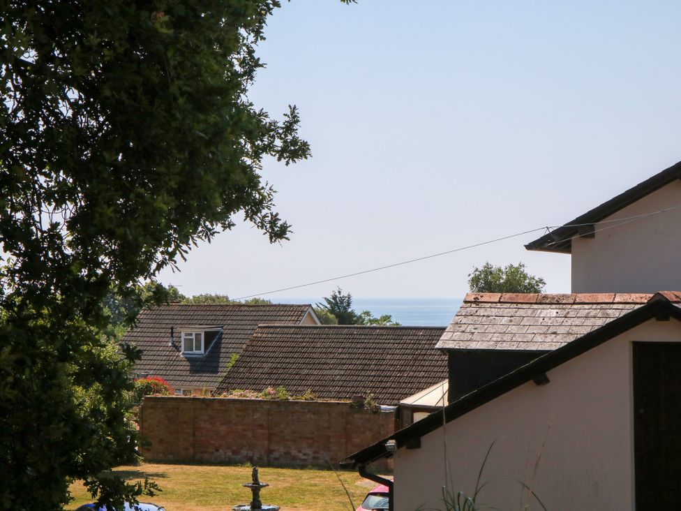 A view of the sea and houses at Gorway Cottage Teignmouth