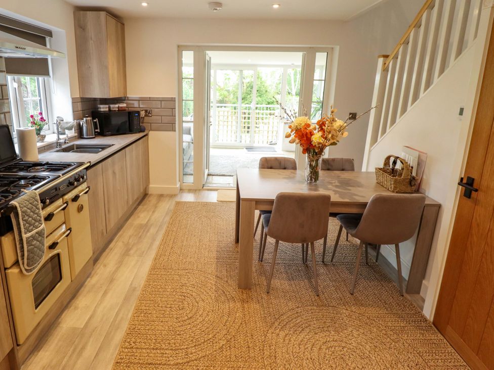 A kitchen with a dining area at The Hen House 
