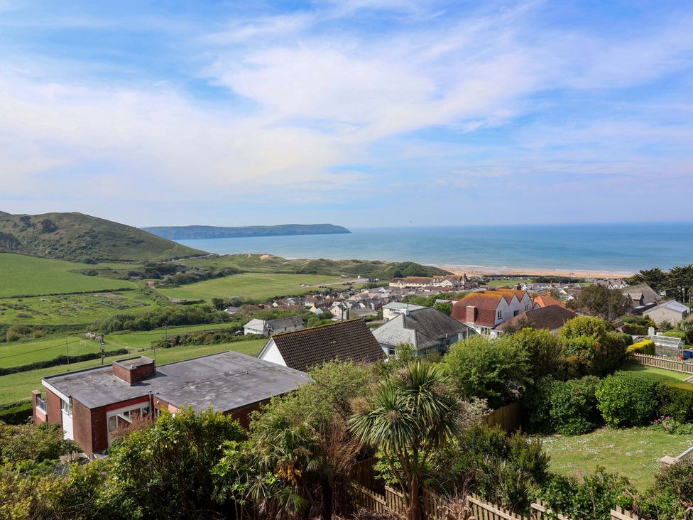 A view of hills, ocean and houses at 15 Chichester Park