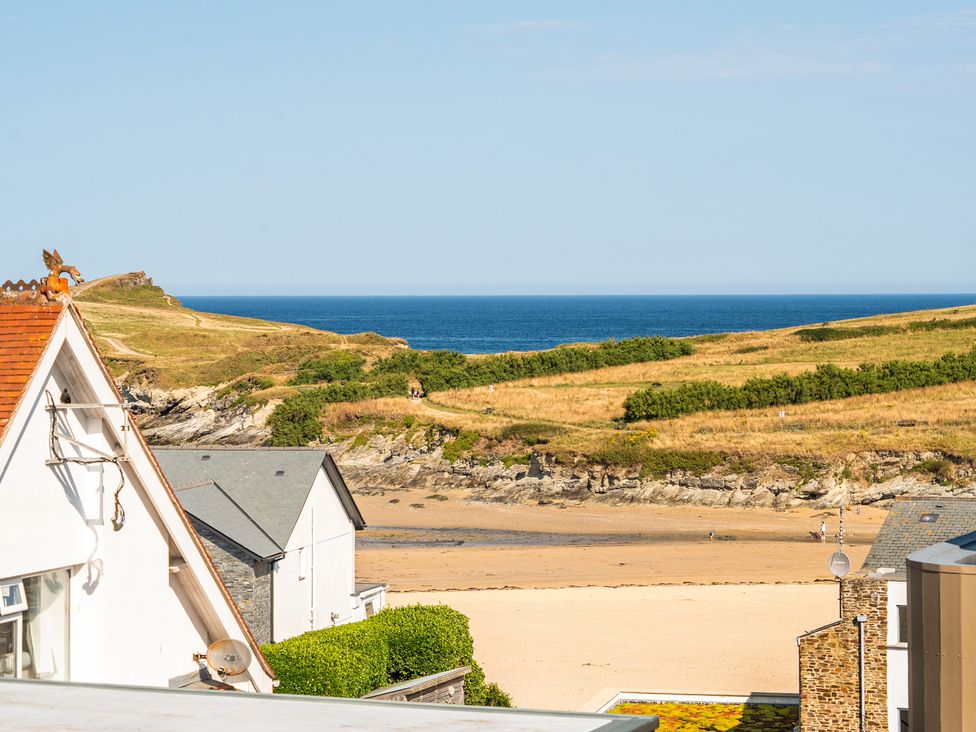 View of the sea and hilly landscape from a property at Seascape in Newquay