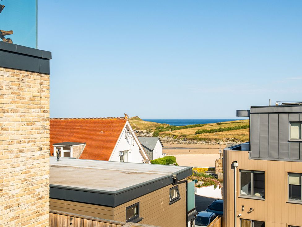 View of the sea and hills from a building at Seascape in Newquay
