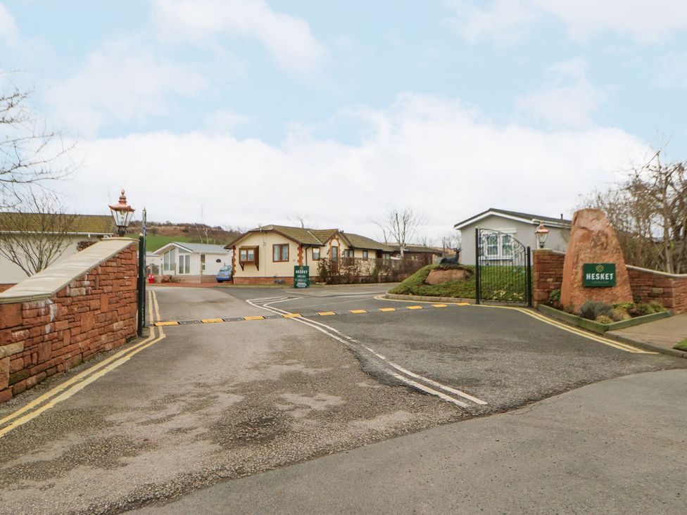 An entrance to a residential park with houses at Heskett in Carlisle
