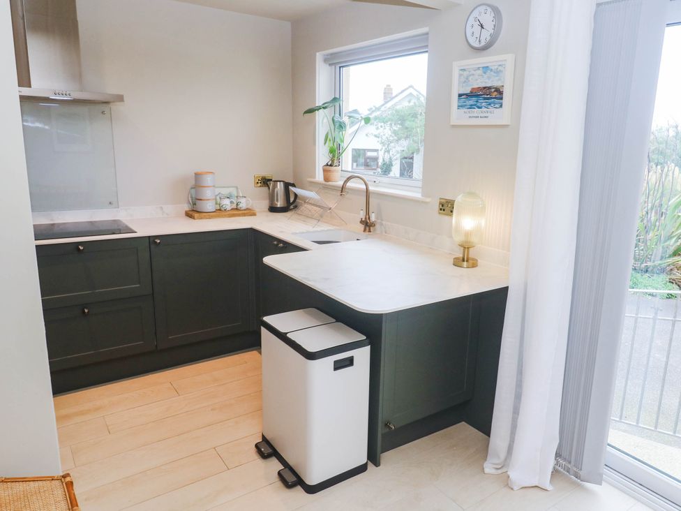 A kitchen with a sink and counter at 8 Yellow Sands in Padstow