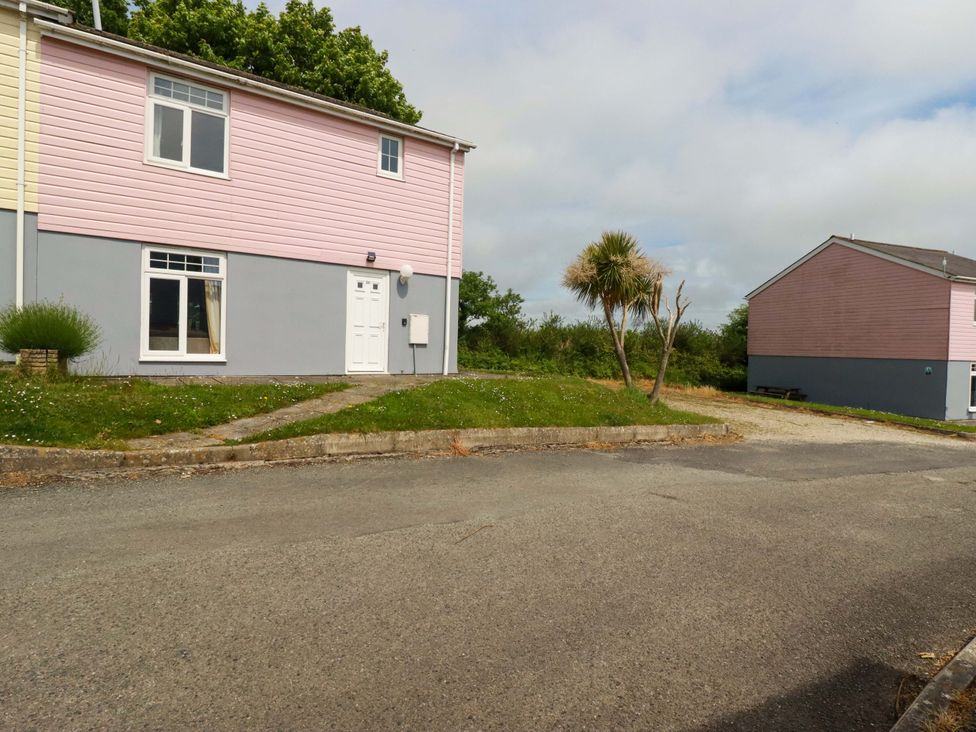 A house with windows and a door outside at 4 bed number 20 Newquay