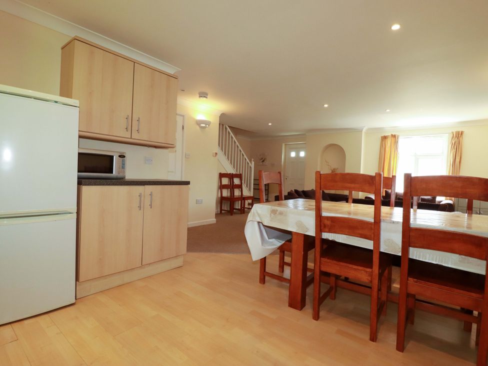 A kitchen with dining area at 4 bed number 20 Newquay