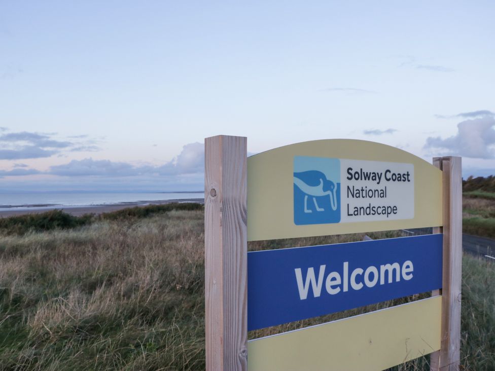 A welcome sign for Solway Coast National Landscape