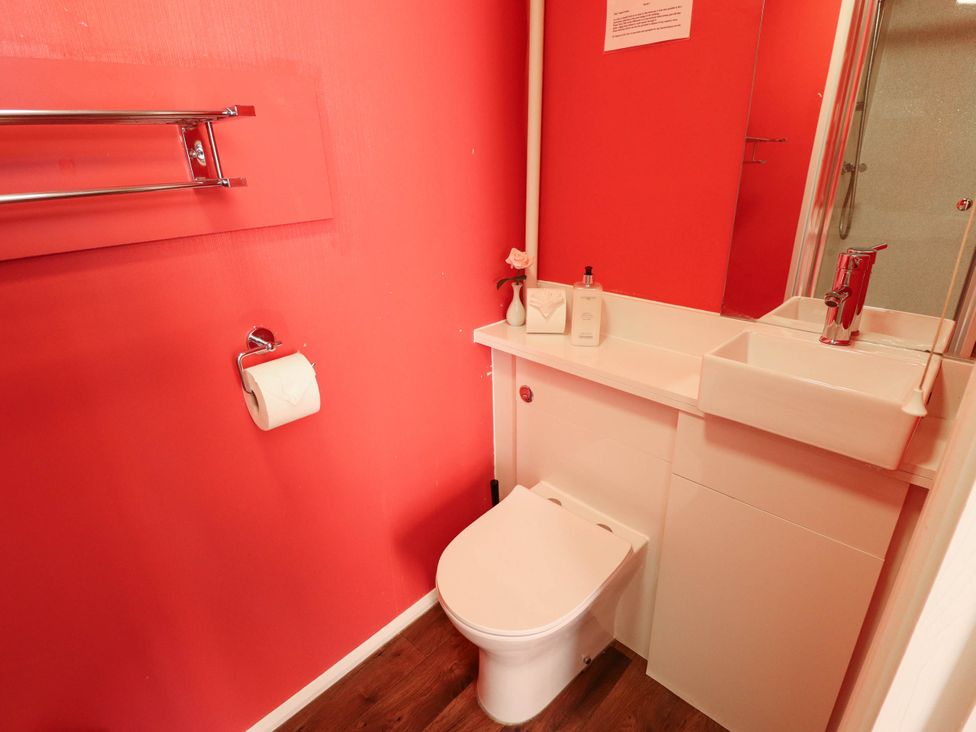 A bathroom with a sink and toilet at The Skegness Hotel in Skegness