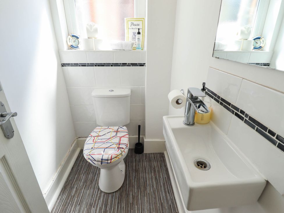 A bathroom with a toilet and sink at The Skegness Hotel in Skegness