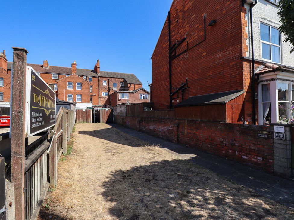 A pathway alongside buildings at The Skegness Hotel in Skegness