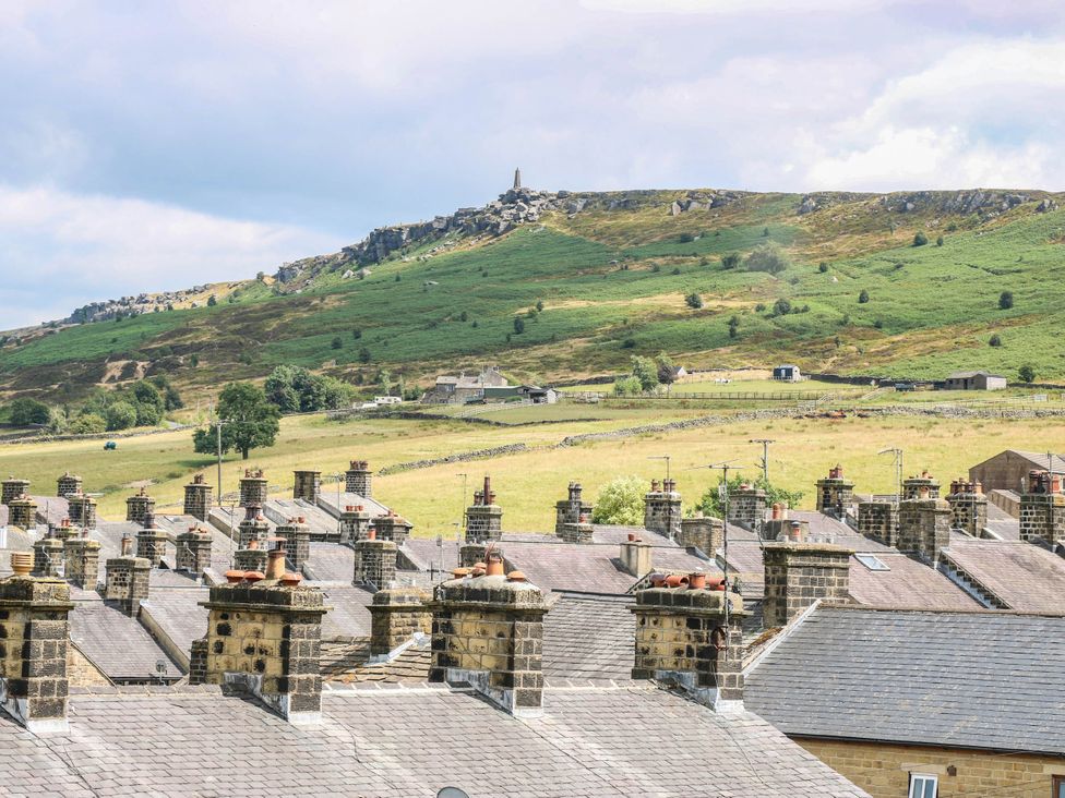 A view of rooftops and hills at 10 Park Road in 