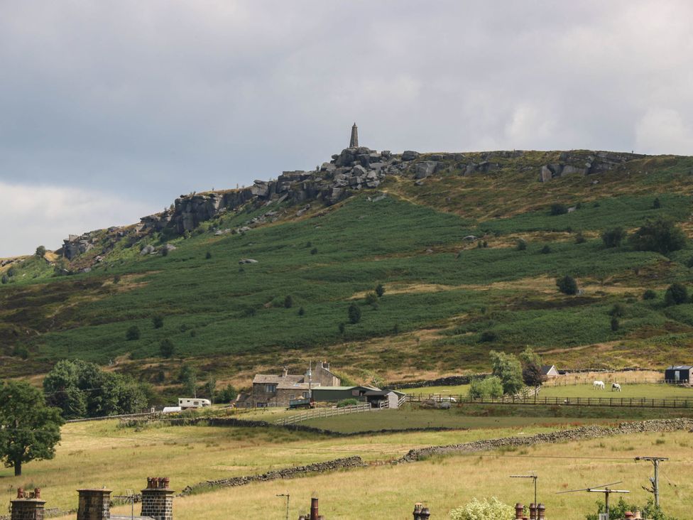 A hill with a monument and fields at 10 Park Road