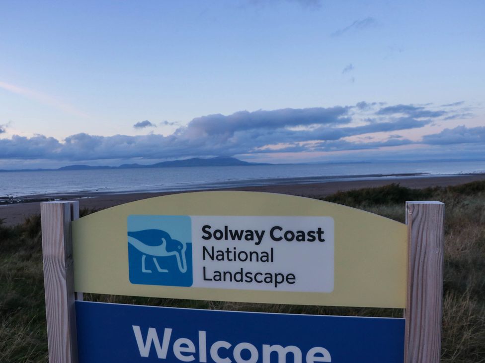 A welcome sign for Solway Coast National Landscape near the sea at 24 Harrington Road Workington