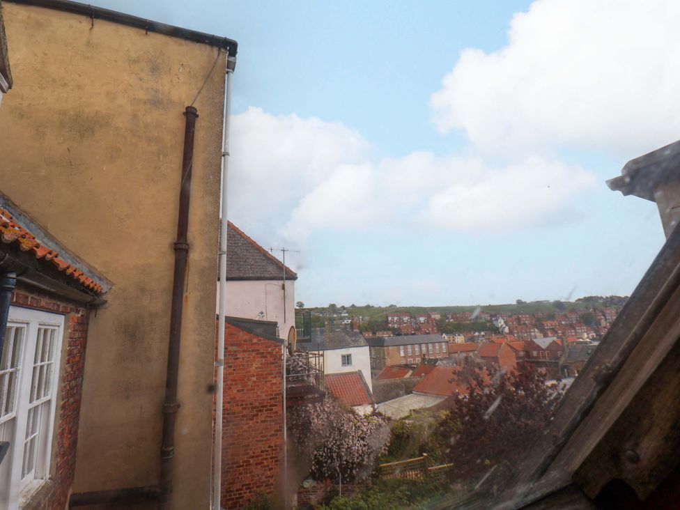 A view of rooftops and buildings at Wick Cottage in Whitby