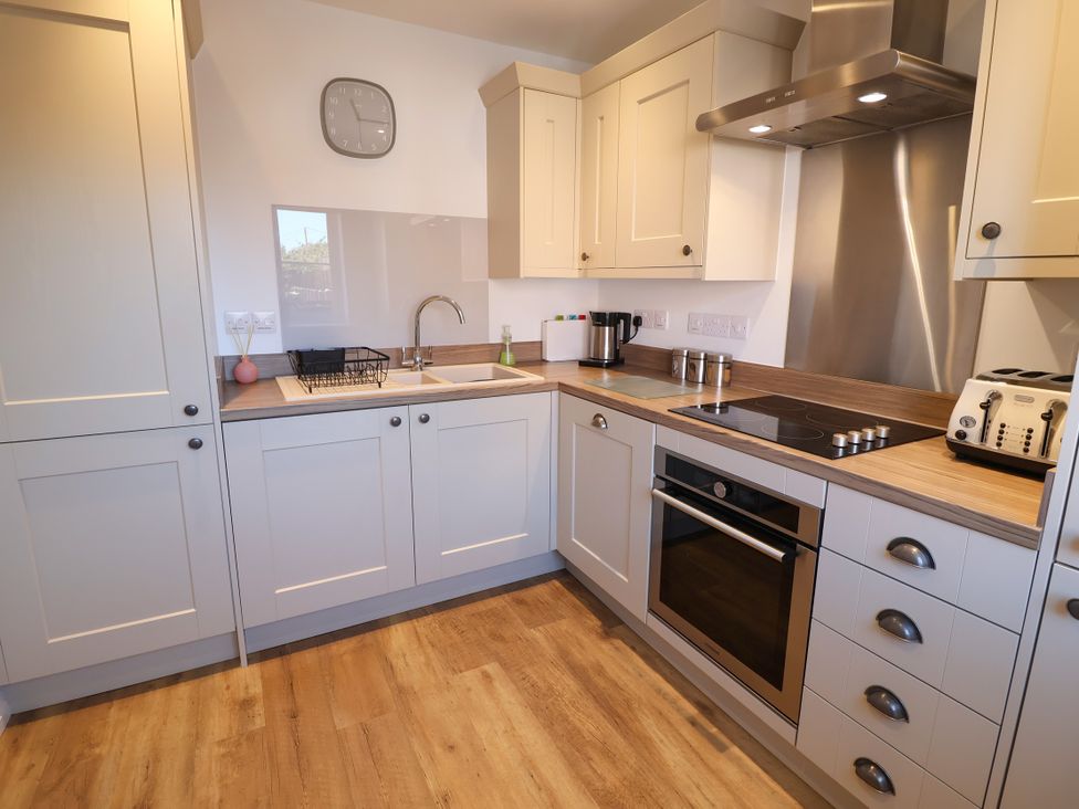 A kitchen with modern fixtures and appliances at Lapwings, Aldeburgh