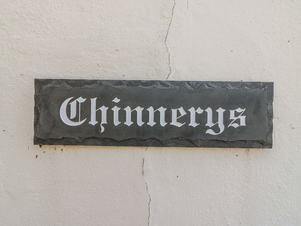 A sign reading Chinnerys on a wall at The Annex in Cavendish Near Sudbury