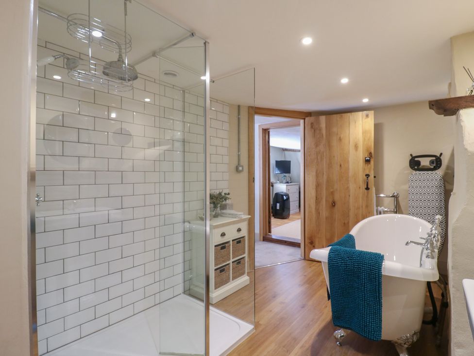 A bathroom with shower and bathtub at The Annex Cavendish Near Sudbury