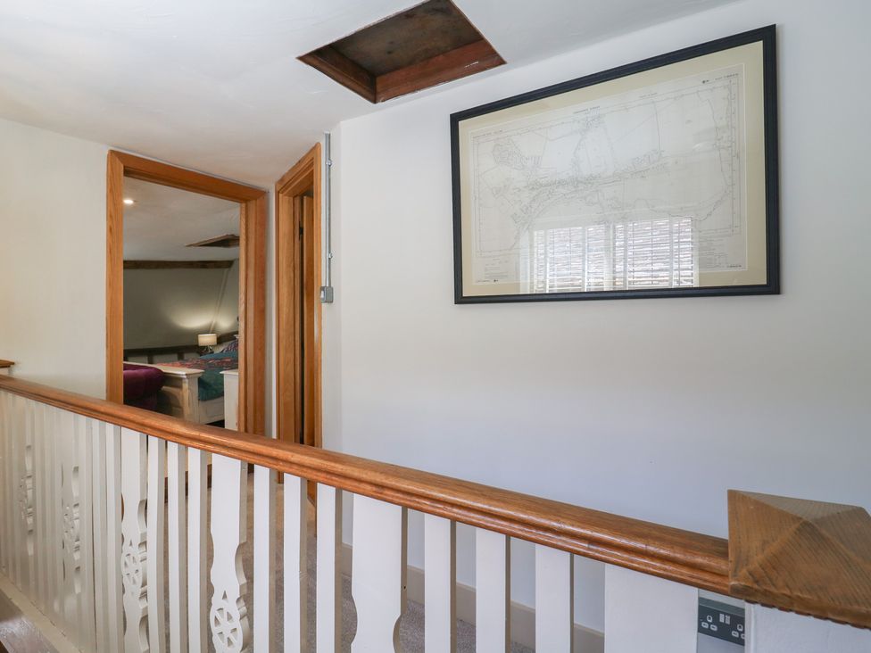 A hallway with a map on the wall at The Annex in Cavendish Near Sudbury