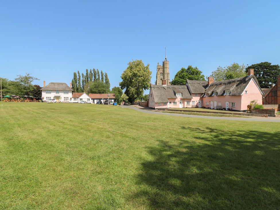 A view of houses and a church tower in an outdoor area at The Annex in Cavendish Near Sudbury