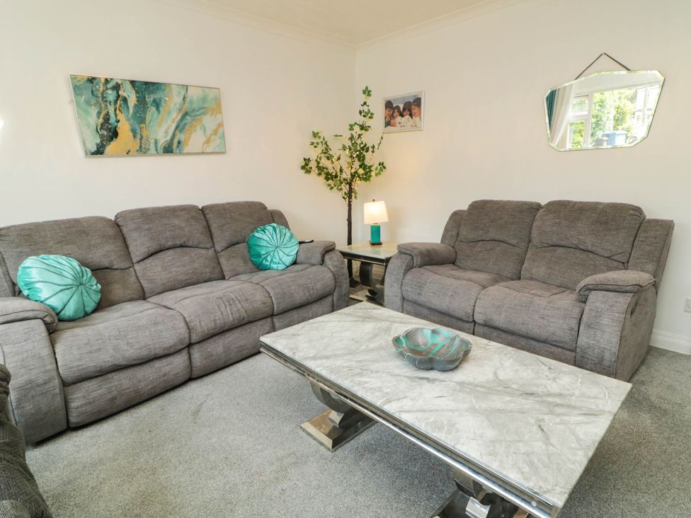 A living room with sofas and a coffee table at 59 Nursery Avenue Coleraine