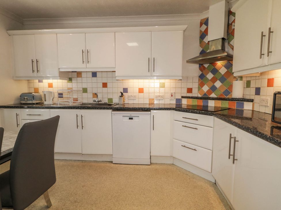 A kitchen with cabinets and appliances at 59 Nursery Avenue Coleraine