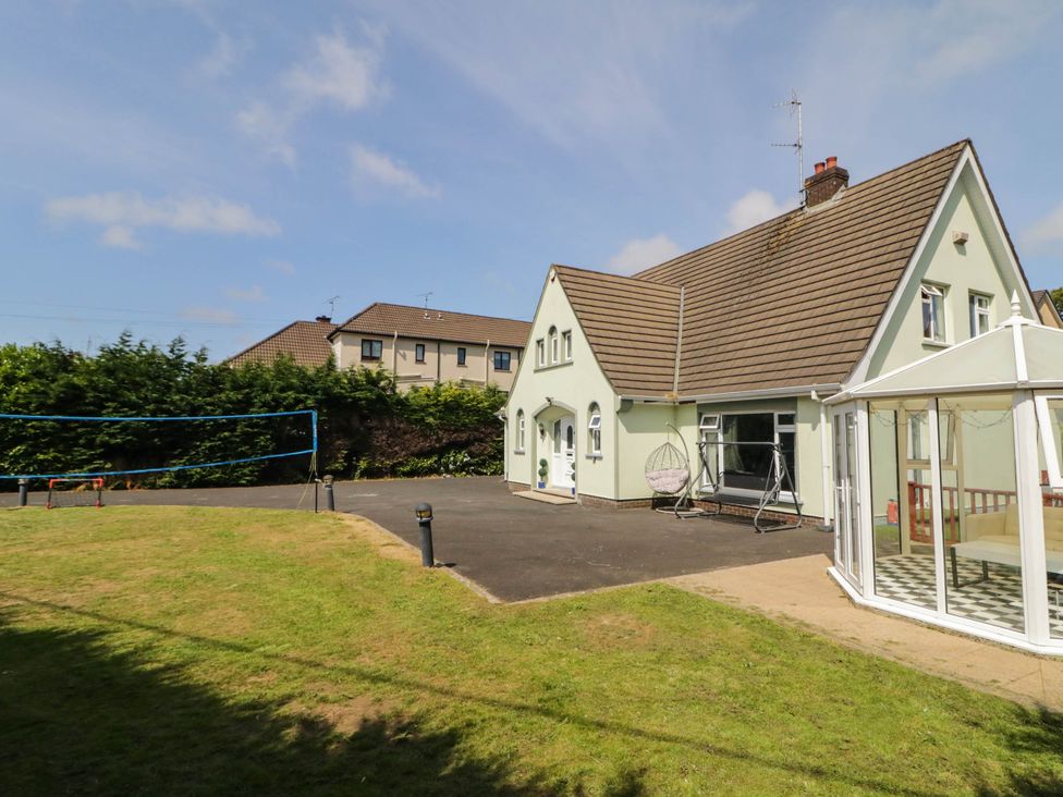 A house with a conservatory and volleyball area at 59 Nursery Avenue Coleraine