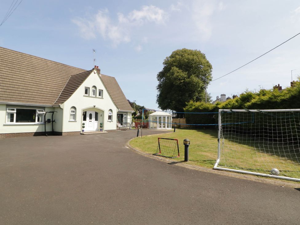 An outdoor area with a house and garden at 59 Nursery Avenue, Coleraine
