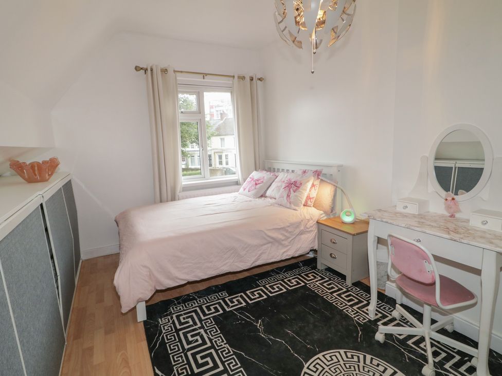 A bedroom with bed and desk at 59 Nursery Avenue in Coleraine