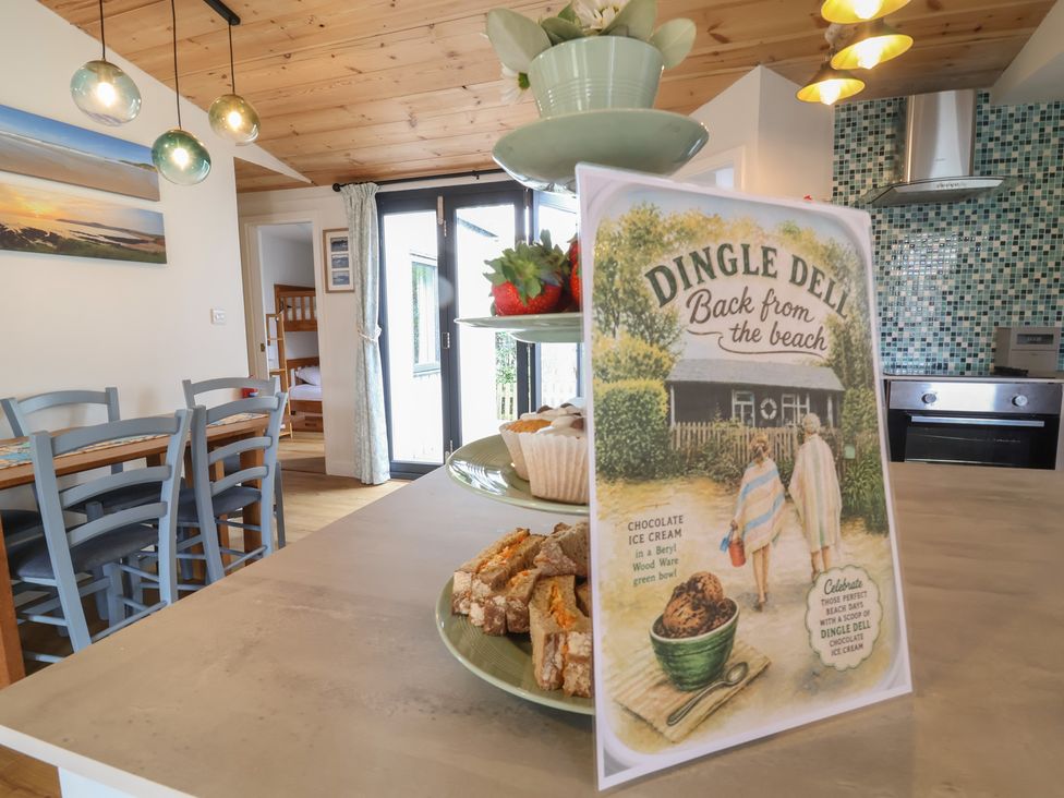 A kitchen with a menu and sweets displayed at Dingle Dell in Braunton