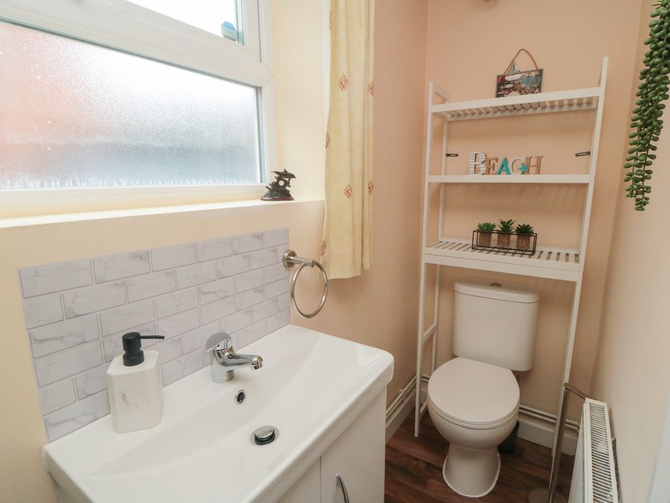 A bathroom with a sink and toilet at Memory Maker in Bridlington
