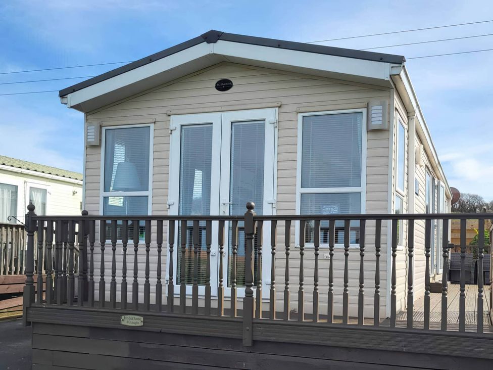 A caravan with a balcony at BandR Turnberry Escape Scotland, Girvan