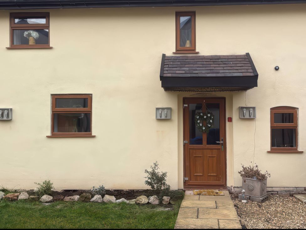An entrance with a door and windows at Rural 2 double bedrooms Barn Mill Meece near Eccleshall