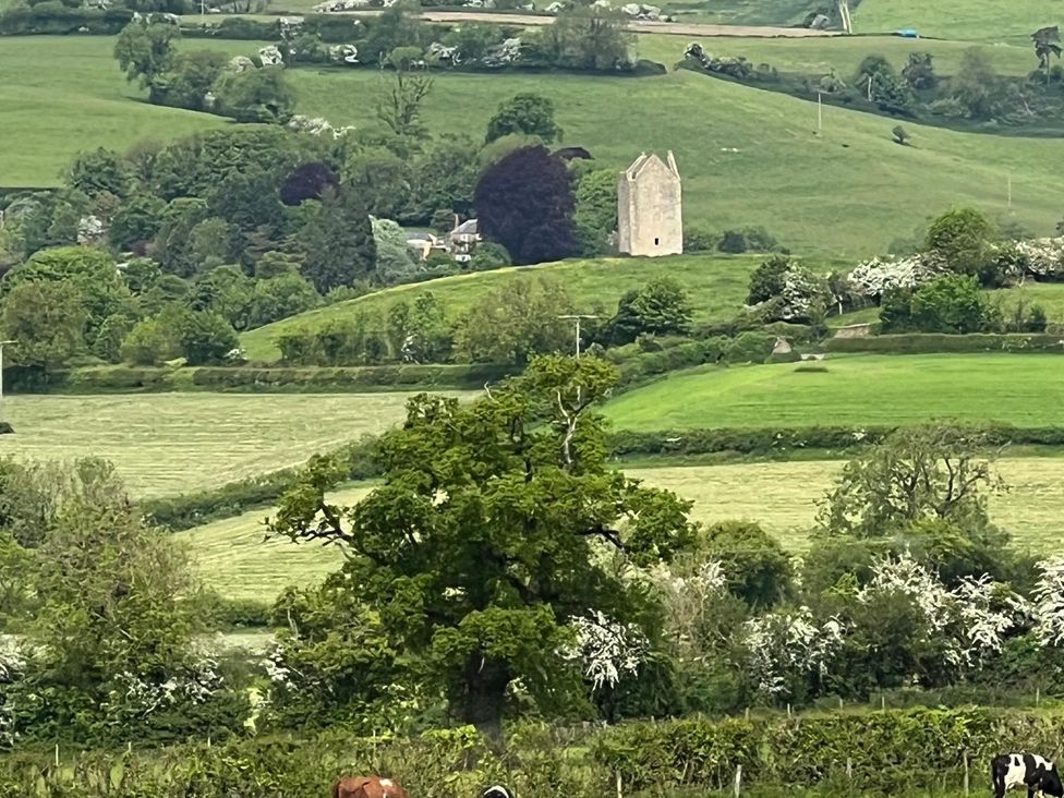 A landscape with a ruin and trees at 2 Guests Studio - Free Parking - Stunning Views near Bruton