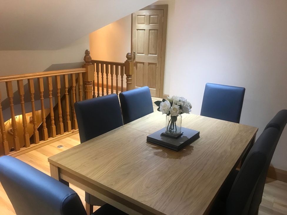 A dining room with a table and chairs at Dungannon 2 Bed Bungalow - Sleeps 5 - Pet Friendly near Dungannon