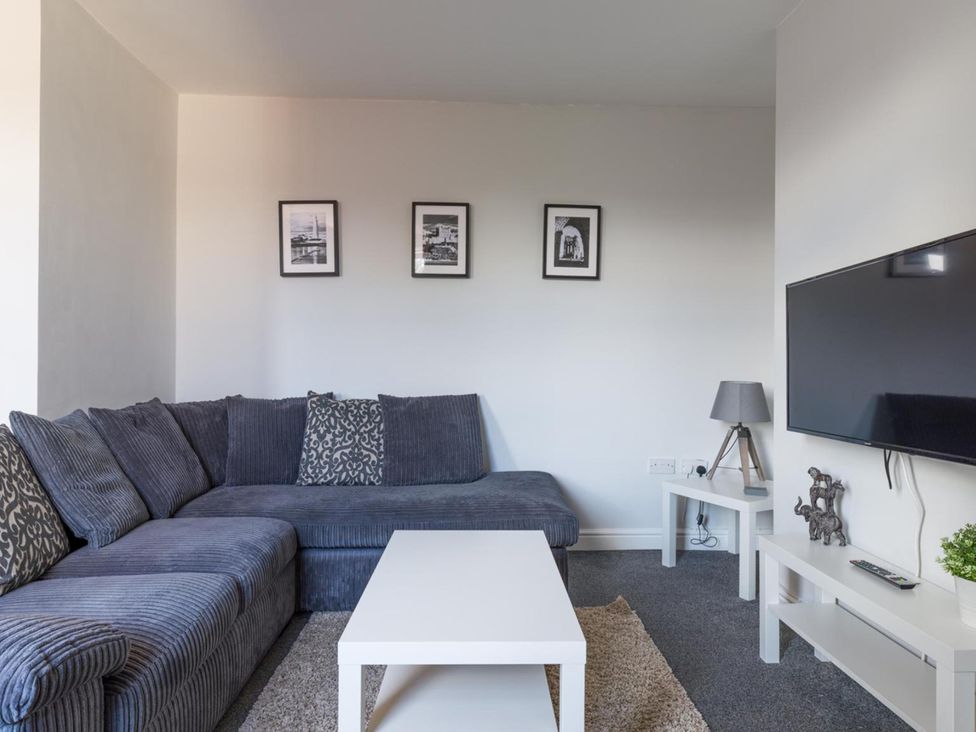 A living room with a sofa and a television at Lily Apartment - Sleeps 3 - Pet friendly - Parking in Bedlington