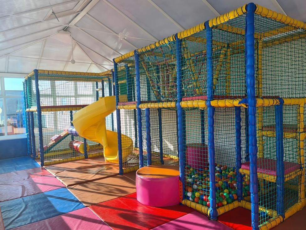 A play area with climbing structure and slide at 3 Bed, Sleeps 6, Parking