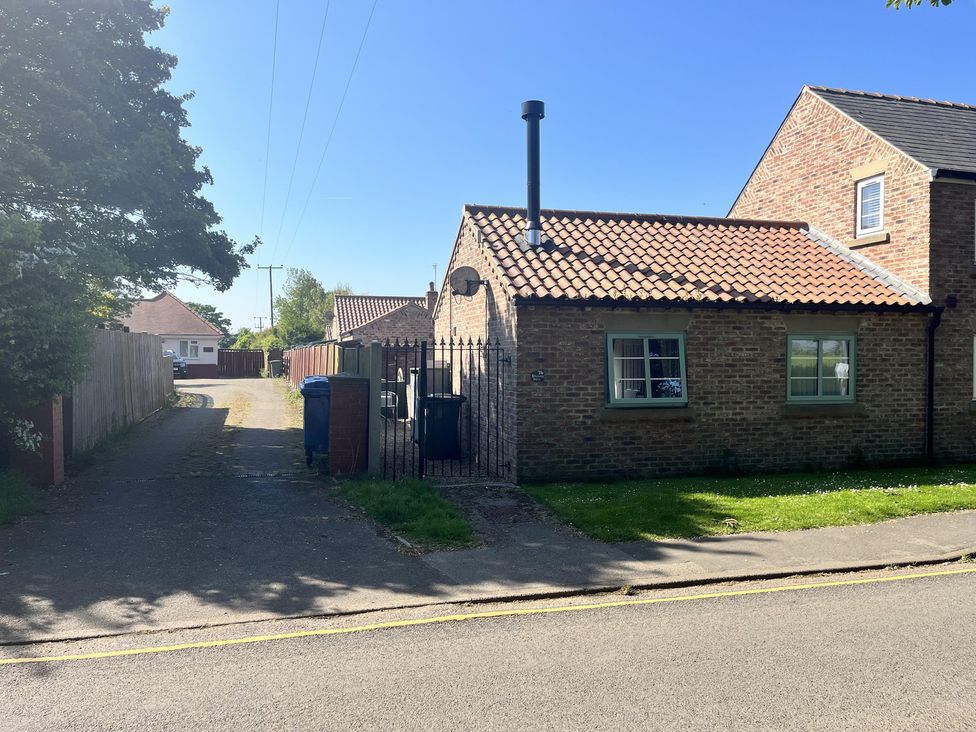 A house with a gate and pathway at TBC in 