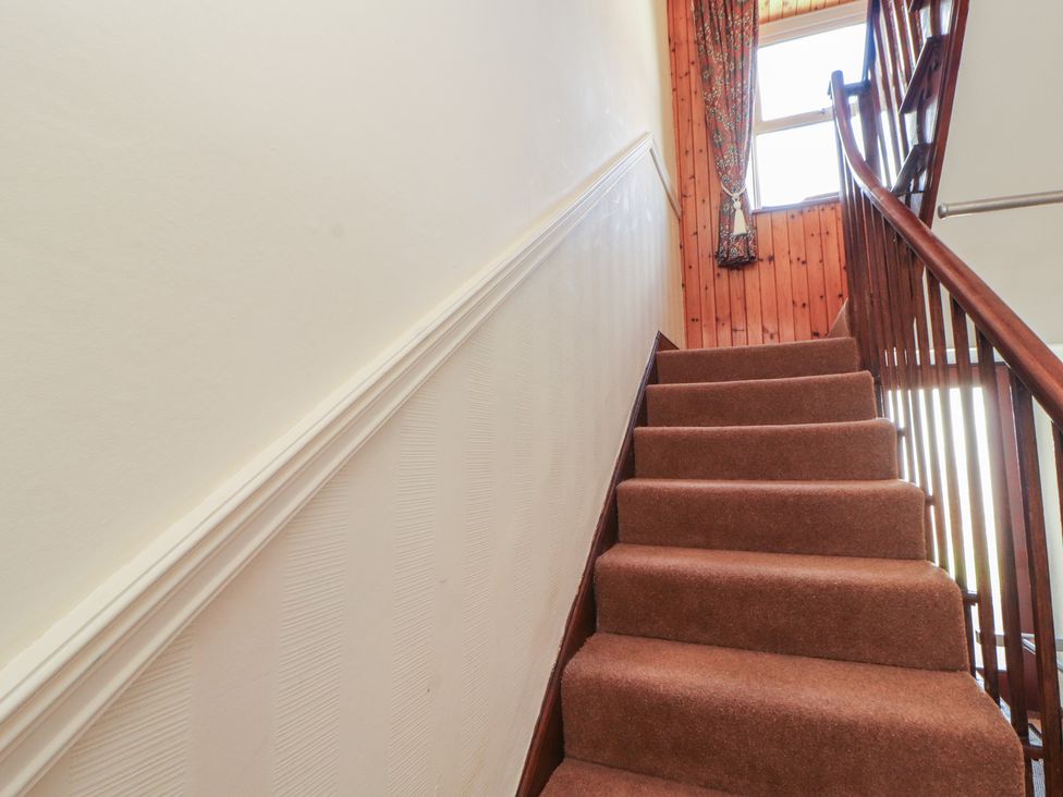 A staircase leading to a window at 30 George Street in Wigton