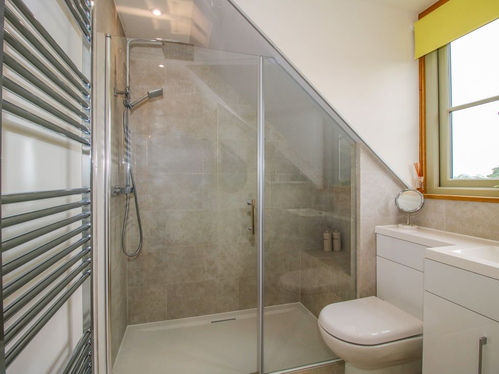 A bathroom with a shower and toilet at Little Acre in Leominster