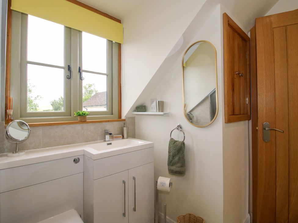 A bathroom with sink and toilet at Little Acre in Leominster