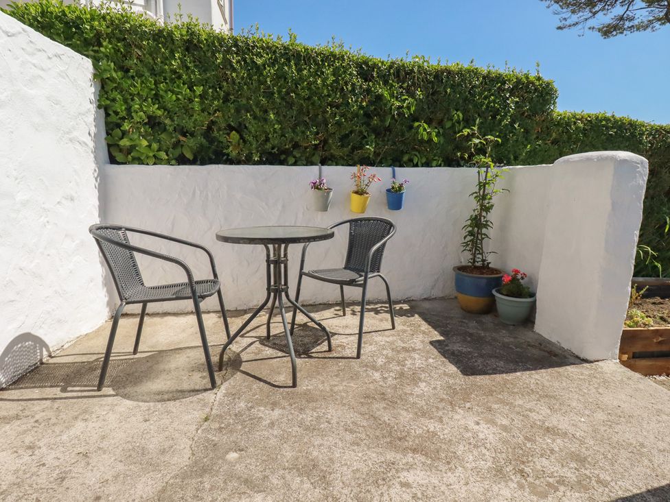 A table and chairs on a patio at 39 Southgate Street 
