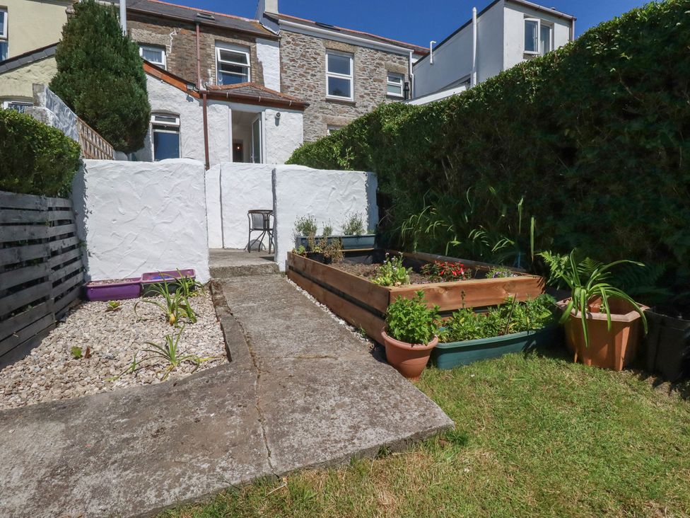 A garden with a pathway and raised flower beds at 39 Southgate Street