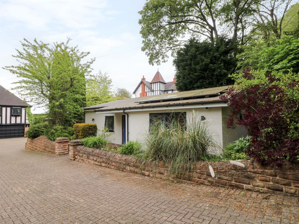 A house surrounded by trees and a driveway at Annex at 3 Lucknow Drive Nottingham