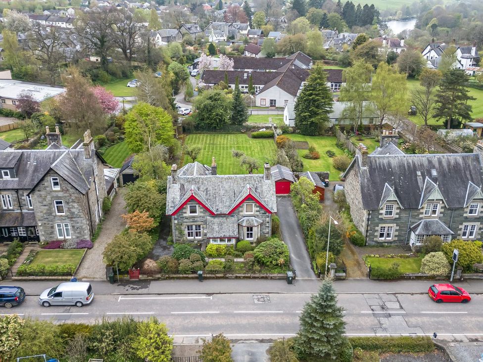 An aerial view of houses and gardens on a street at Edengrove Aberfeldy