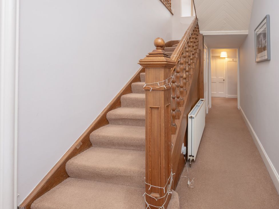 A staircase leading to a hallway at Edengrove in Aberfeldy