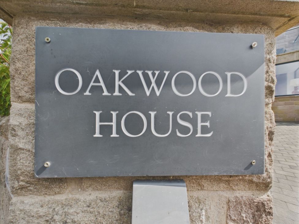 A house sign reading Oakwood House at Oakwood House in Tansley near Matlock