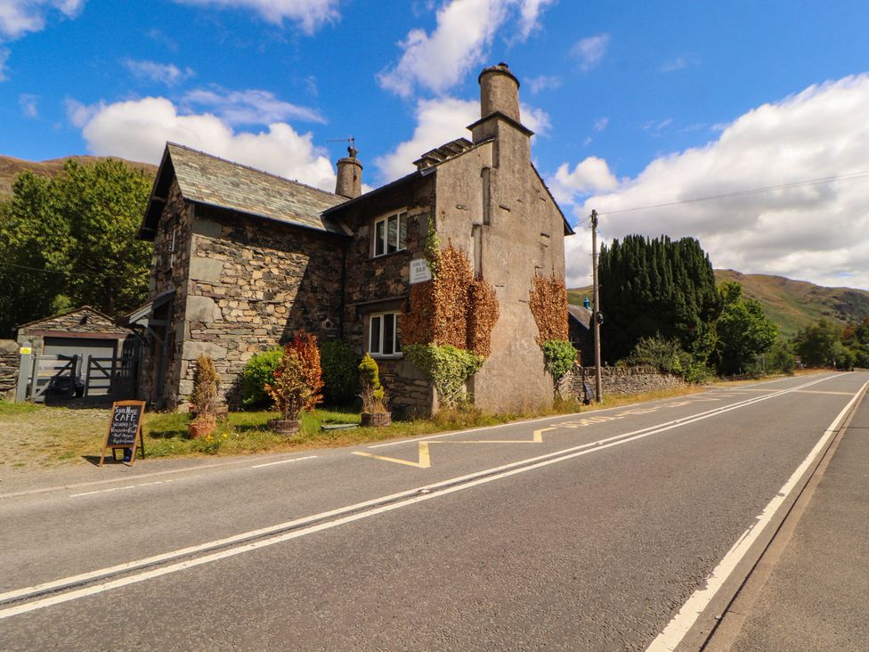 A stone building near a road at The School House in Penrith