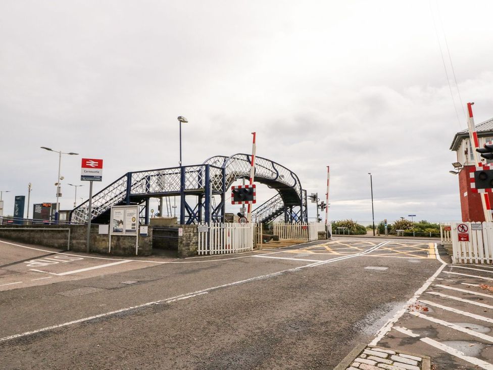 A footbridge and railway crossing at Carnoustie